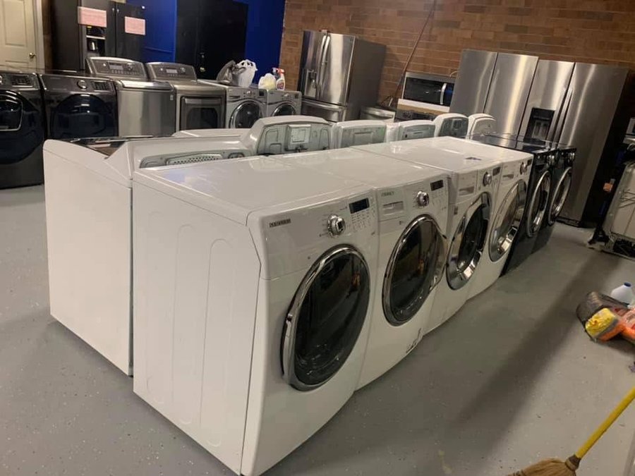 The L&C New & Used Appliances showroom in Winston-Salem, rows of washers, dryers, and refrigerators